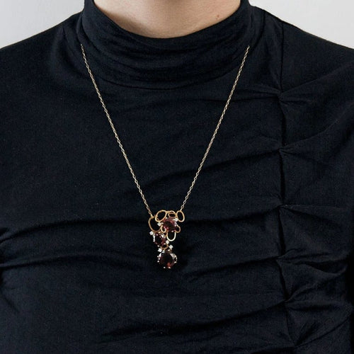 Collier Collier - Grenats et diamants en or jaune 750/1000 58 Facettes 35100030