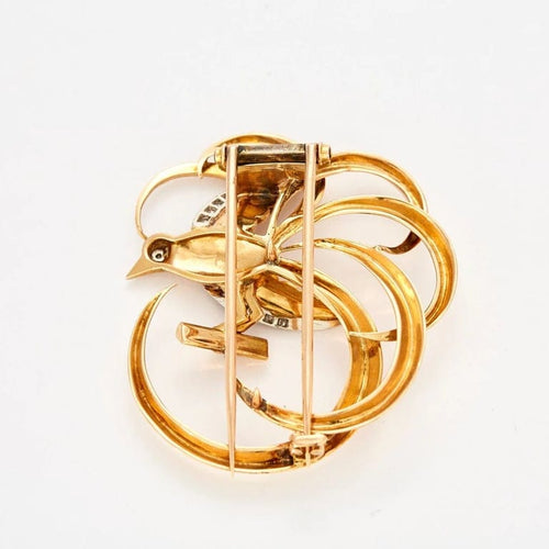 Broche Broche oiseau de paradis en or jaune 18k et diamants 58 Facettes 37100042