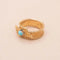 Bague 54 Bague ruban vintage en or jaune 18K et turquoise 58 Facettes 793328