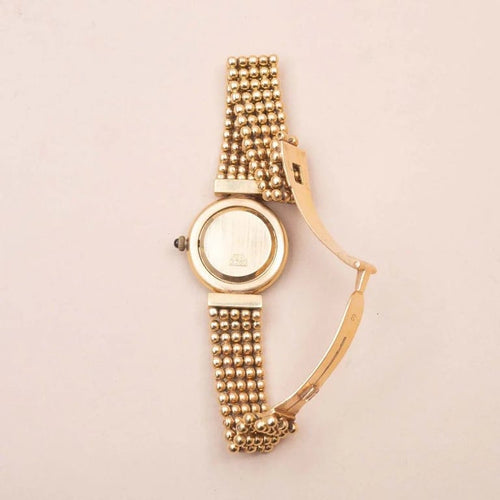 Montre Montre tennis vintage en or jaune 18K et diamants 1,90 ct 58 Facettes 793339