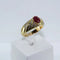 Bague 59 Bague torsadée en or jaune 18 carats avec rubis et diamants 58 Facettes