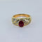 Bague 59 Bague torsadée en or jaune avec rubis et diamants 58 Facettes