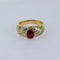 Bague 59 Bague torsadée en or jaune 18 carats avec rubis et diamants 58 Facettes