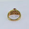 Bague 59 Bague torsadée en or jaune 18 carats avec rubis et diamants 58 Facettes