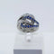 Bague 53 Bague entrelacée en or gris, saphirs et diamants 58 Facettes