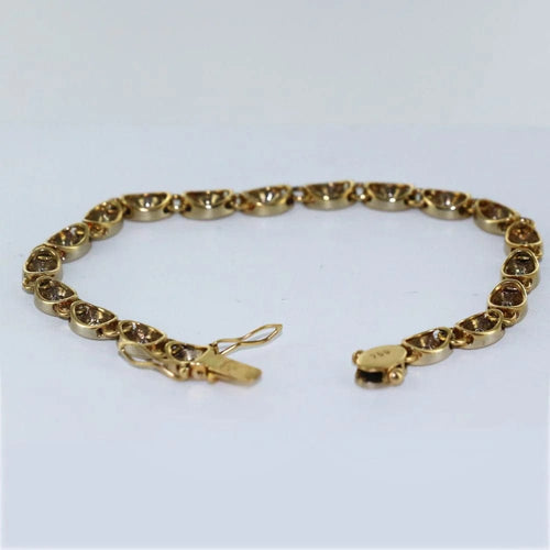 Bracelet Bracelet en or jaune 18 carats serti de diamants 58 Facettes