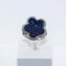 Bague 52 Bague fleur en or gris 18 carats, saphirs et diamants 58 Facettes