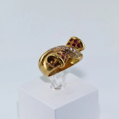 Bague 56 Bague nœud croisée en or jaune 18 carats, diamants et rubis 58 Facettes