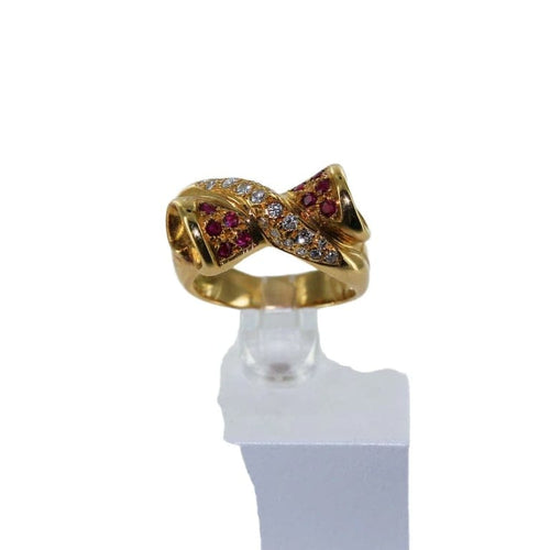 Bague 56 Bague nœud croisée en or jaune 18 carats, diamants et rubis 58 Facettes