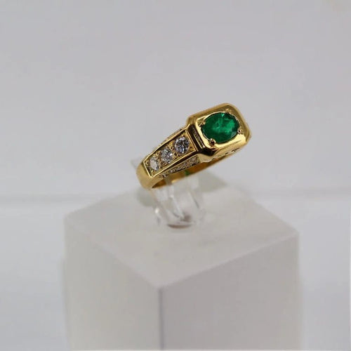 Bague 53 Bague émeraude et diamants en or jaune 18 carats 58 Facettes