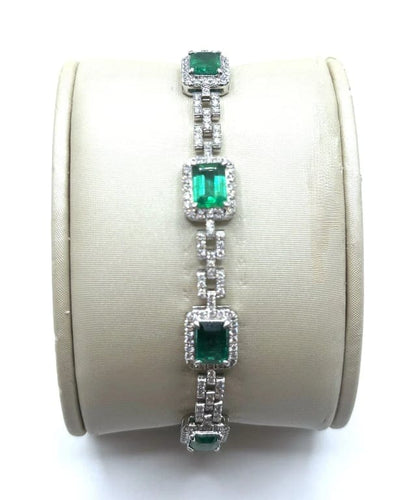 Bracelet Bracelet rivière en or gris 18 carats, émeraudes et diamants 58 Facettes