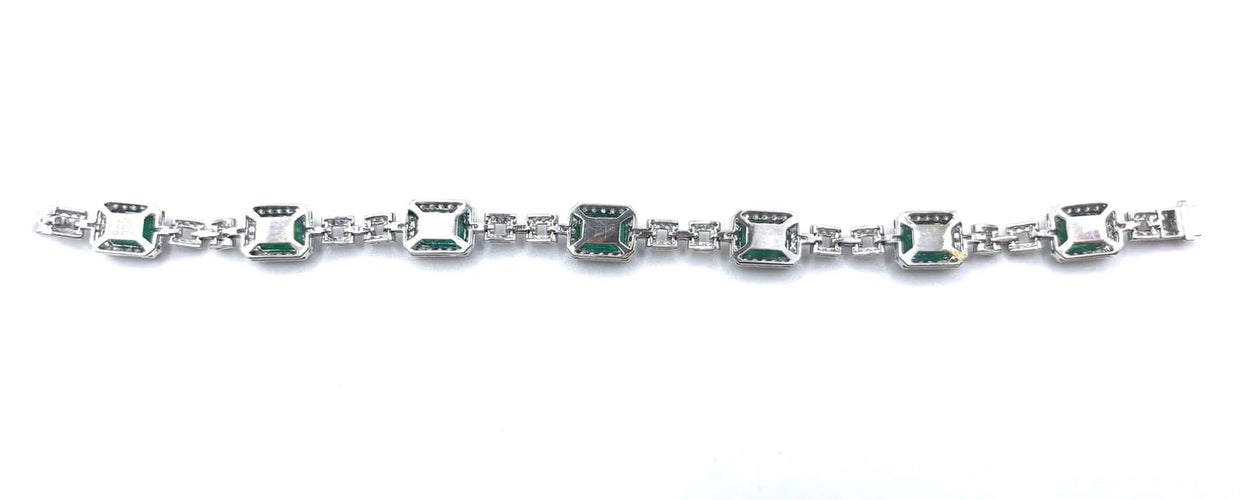 Bracelet Bracelet rivière en or gris 18 carats, émeraudes et diamants 58 Facettes