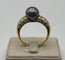 Bague 63 Bague perle de Tahiti et diamants en or jaune 18 carats 58 Facettes