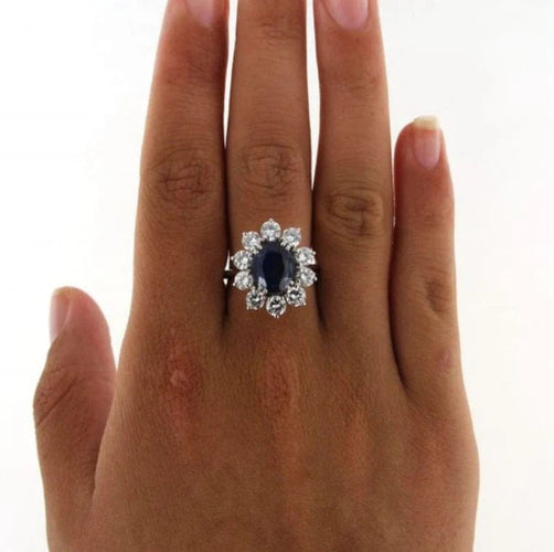 Bague 54 Bague marguerite - Bague en or gris avec saphir et diamants 58 Facettes 5956b