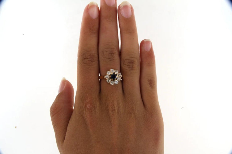 Bague 52 Bague marguerite en or jaune 18 carats, saphir et diamants 58 Facettes 4172l