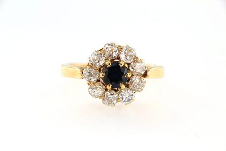 Bague 52 Bague marguerite en or jaune 18 carats, saphir et diamants 58 Facettes 4172l