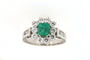 Bague 60 Bague marguerite à émeraude en or gris 18 carats et diamants 58 Facettes 6380j
