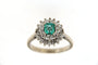 Bague 57 Bague marguerite en or gris 18 carats, émeraude et diamants 58 Facettes 5792t