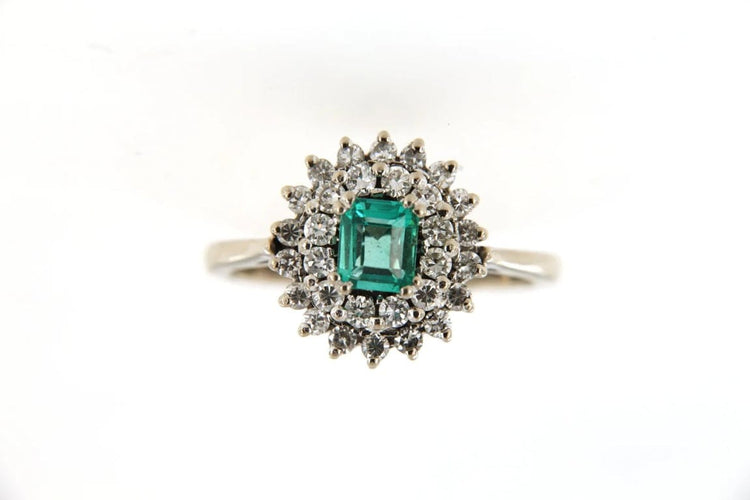 Bague 57 Bague marguerite en or gris 18 carats, émeraude et diamants 58 Facettes 5792t