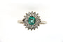 Bague 57 Bague marguerite en or gris 18 carats, émeraude et diamants 58 Facettes 5792t