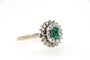 Bague 57 Bague marguerite en or gris 18 carats, émeraude et diamants 58 Facettes 5792t