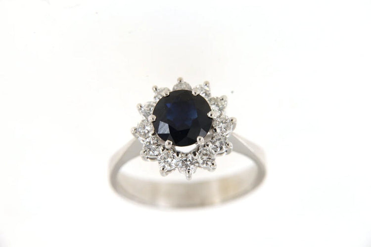 Bague 54 Bague marguerite forme fleur en or gris 18 carats, saphir et diamants 58 Facettes 6395y