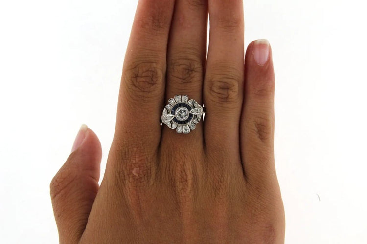 Bague 57 Bague marguerite en platine avec diamants et saphirs 58 Facettes 6492r