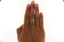 Bague 53 Bague marguerite - Diamants et émeraude en or gris 18 carats 58 Facettes 6087c