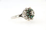 Bague 53 Bague marguerite - Diamants et émeraude en or gris 18 carats 58 Facettes 6087c