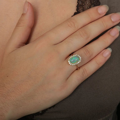 Bague 60 Bague cocktail en or jaune 18K avec opale et diamants 58 Facettes
