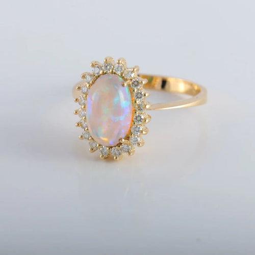 Bague 60 Bague cocktail en or jaune 18K avec opale et diamants 58 Facettes