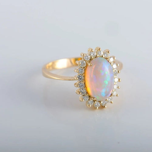Bague 60 Bague cocktail en or jaune 18K avec opale et diamants 58 Facettes