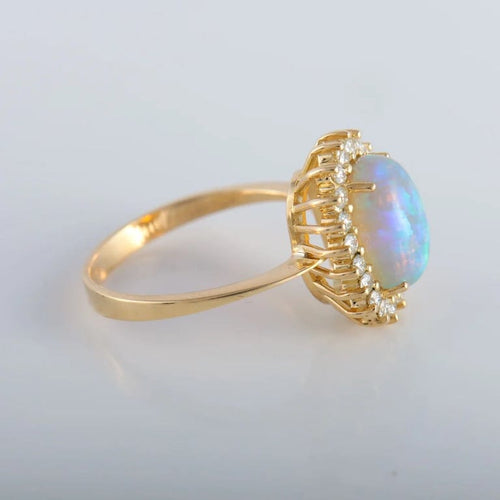 Bague 60 Bague cocktail en or jaune 18K avec opale et diamants 58 Facettes