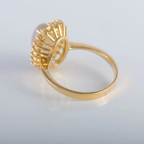 Bague 60 Bague cocktail en or jaune 18K avec opale et diamants 58 Facettes