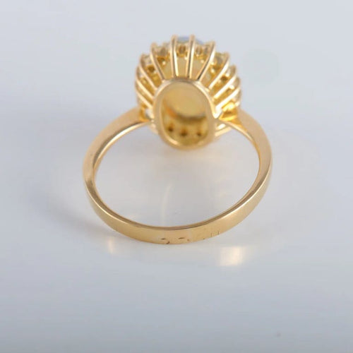Bague 60 Bague cocktail en or jaune 18K avec opale et diamants 58 Facettes