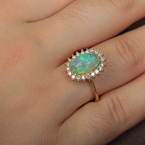 Bague 60 Bague cocktail en or jaune 18K avec opale et diamants 58 Facettes
