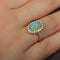 Bague 60 Bague cocktail en or jaune 18K avec opale et diamants 58 Facettes