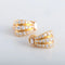 Boucles d'oreilles Boucles d’oreilles demi-jonc en or jaune 18K et diamants 58 Facettes