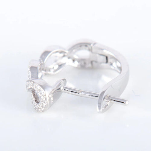 Boucles d'oreilles Boucles d’oreilles torsade en or blanc 18k et diamants 58 Facettes