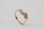 Bague 53 Bague vague en or jaune 18 carats et diamants 58 Facettes