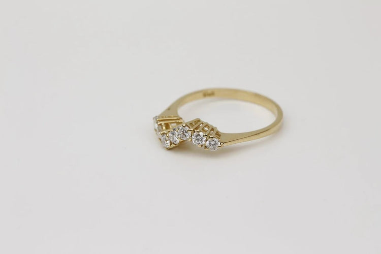 Bague 53 Bague vague en or jaune 18 carats et diamants 58 Facettes