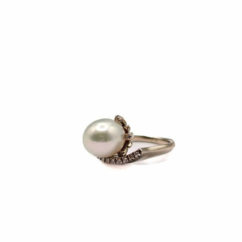 Bague 50 Bague vintage en or blanc 18 carats avec perle de mer et diamants 58 Facettes 21002380