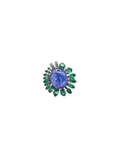 Bague Bague cocktail en or blanc 18 carats avec tanzanite, émeraudes et diamants 58 Facettes 21003769