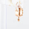 Boucles d'oreilles Boucles d’oreilles pendantes « briquet » XIXe en or jaune 18 carats et demi-perles 58 Facettes