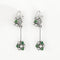Boucles d'oreilles Pendants d’oreilles marguerite en or gris 18 carats, émeraudes et diamants 58 Facettes