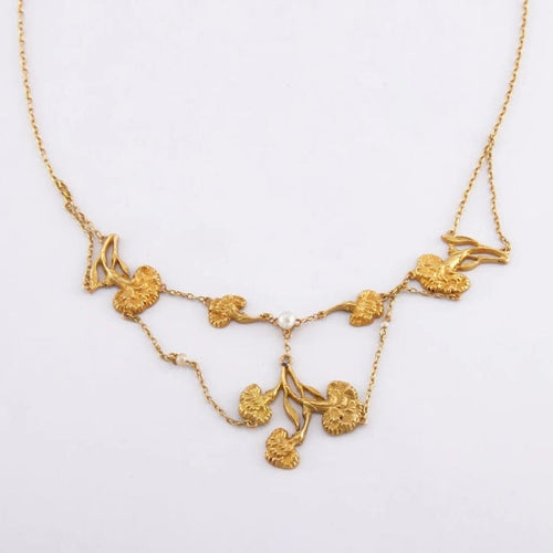 Collier Collier draperie aux œillets en or jaune 18 carats et perles 58 Facettes