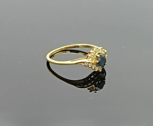 Bague 57 Bague tourbillon en or jaune 18k avec saphir ovale et diamants 58 Facettes