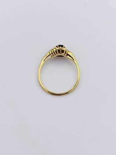 Bague 57 Bague tourbillon en or jaune 18k avec saphir ovale et diamants 58 Facettes