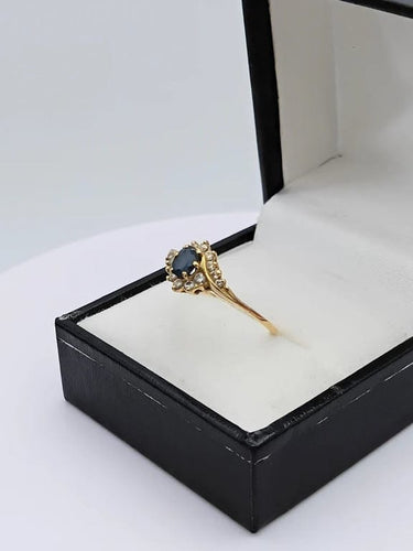 Bague 57 Bague tourbillon en or jaune 18k avec saphir ovale et diamants 58 Facettes