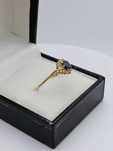 Bague 57 Bague tourbillon en or jaune 18k avec saphir ovale et diamants 58 Facettes